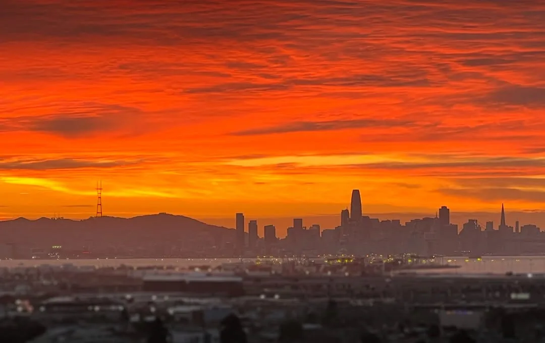 San Francisco with a red fire sky, seen from Oakland.