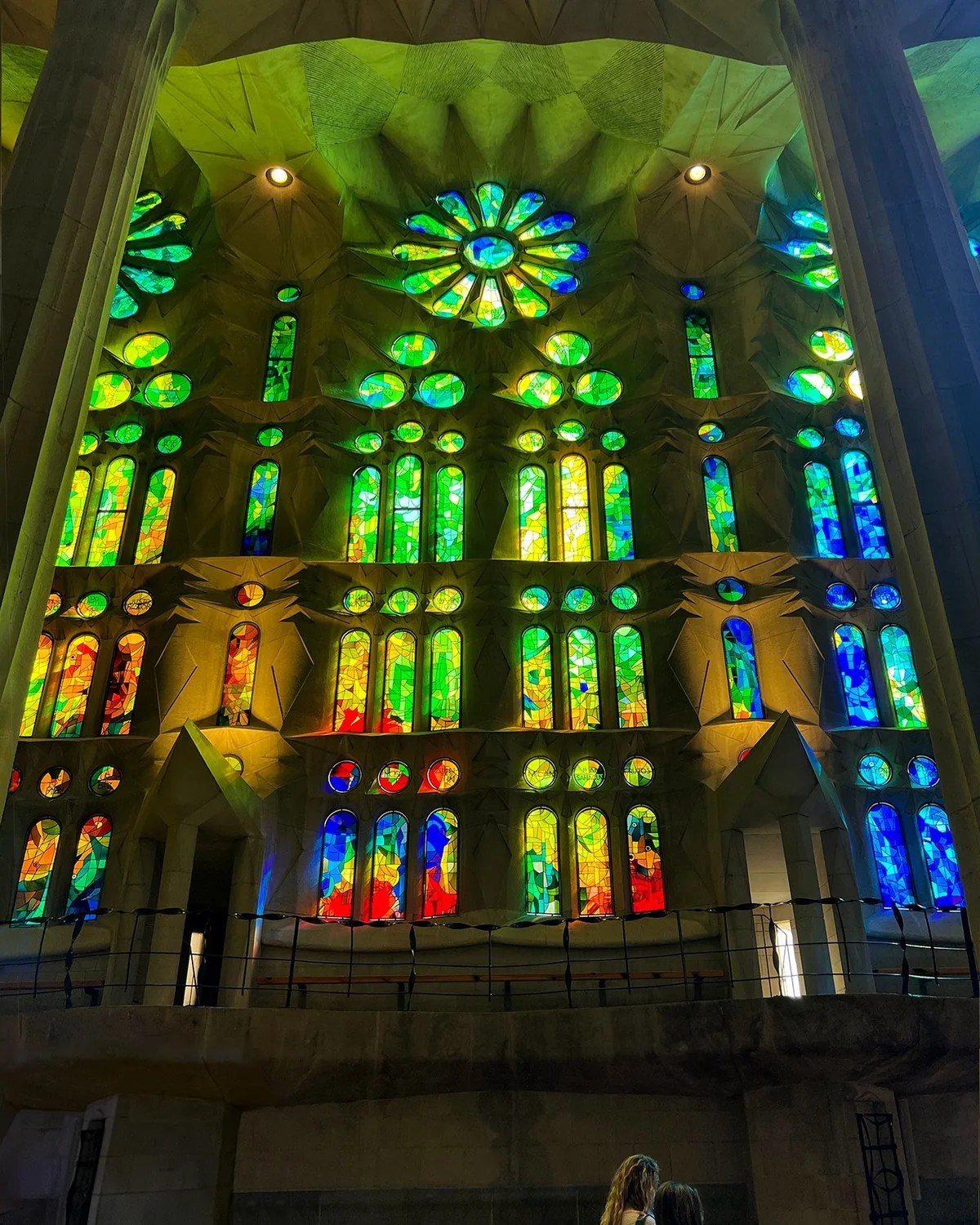 Stained glass windows with light spilling through them.